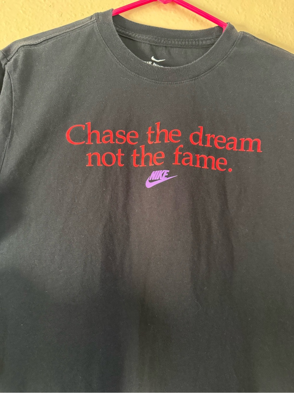 Nike Black Poster with Red Slogan and Purple Logo